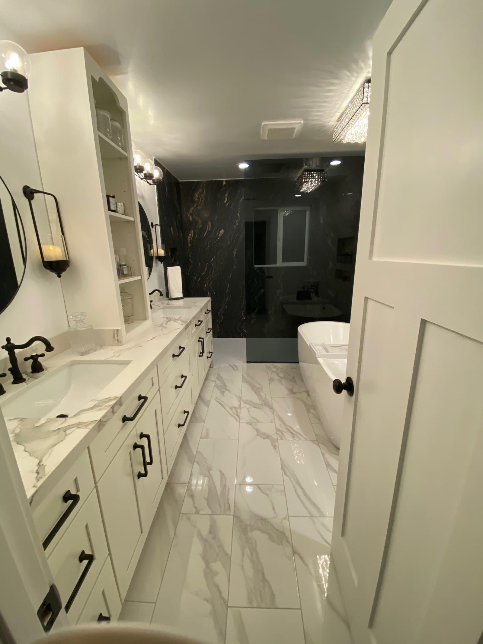Custom stone double vanity with matched marble backsplash